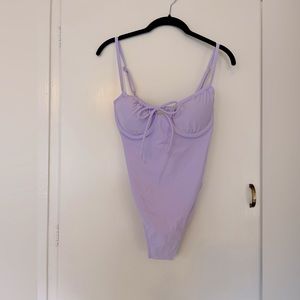NEW, never been worn lavender wild fable swimsuit!! Size small.